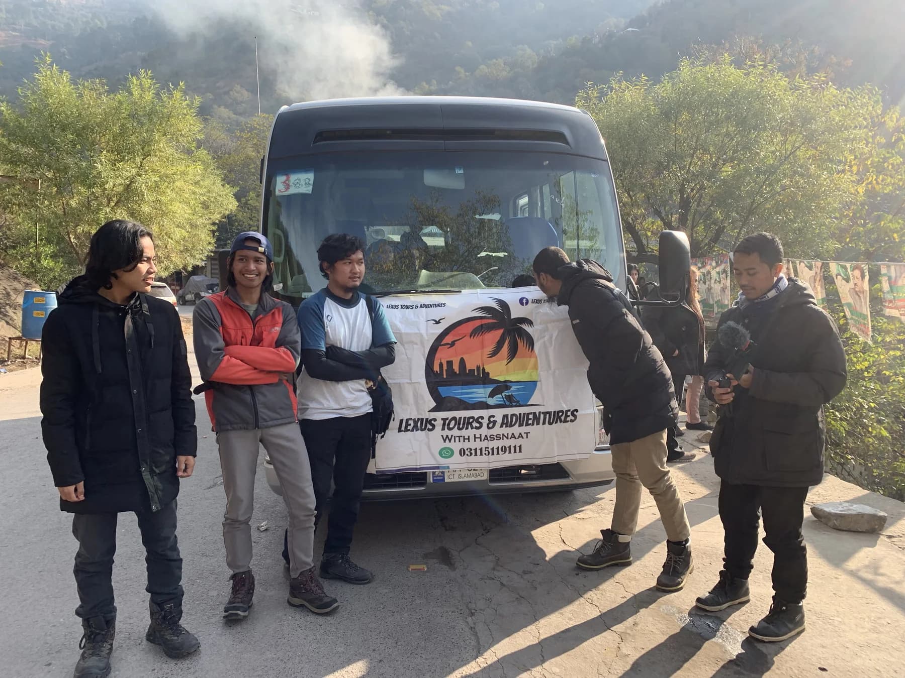 Lexuz Tours travellers gathered beside a coaster before departure