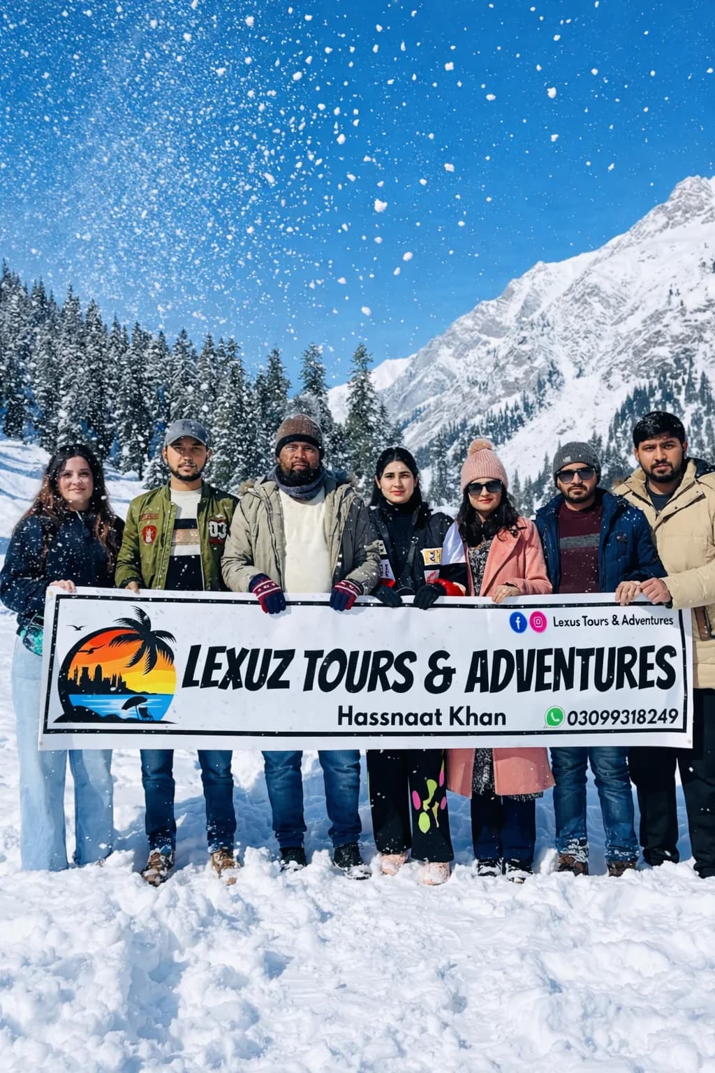 Lexuz Tours group holding a banner in a snowy mountain setting